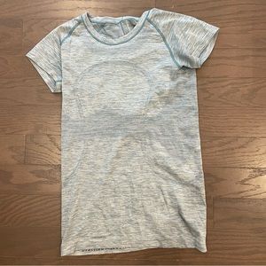 Lululemon light blue swiftly tech short sleeve top. Size 8. Lightly worn.